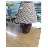 Small burgundy lamp withburgundy and off while