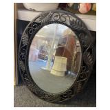 Heavy leaf framed mirror 18x23in