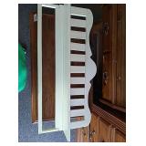 White wood shelf with hanging bar on bottom