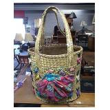 Large wicker carrying bag filled with space