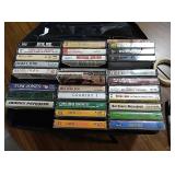 Lots of country cassette tapes in two sided