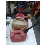 3 gas cans 2-one gallon 1-2.5 gal