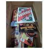 Box of paperback cookbooks of different varieties