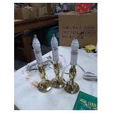 21 brass electric candle lamps with lots of new
