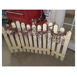 Picket fence decoration with vine berries