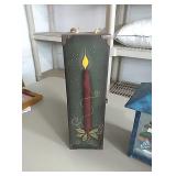 Wooden Christmas box with candle on it,