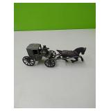 Vintage cast iron horse and buggy with