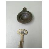 A Watkins metal egg separator and a will produce