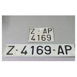 2- foreign license plates...long one is approx