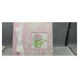 Pink flower with green watering can scrapbook