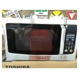 New Toshiba. 1.2 cu.ft microwave oven