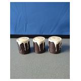 3 small cinnamon roll candles