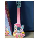 New in box hatchimals 21" mini guitar....cute
