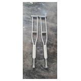 Pair of adjustable crutches