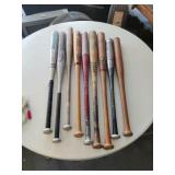 9 Baseball Bats.  Wood & Aluminum
