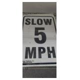SLOW 5 MPH sign