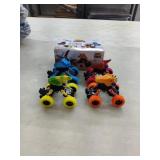 4 New Dino Trucks. Pull back & Release