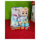 New Cocomelon Doll.   Press Tummy and giggles