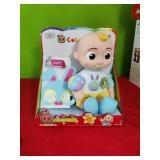 New Cocomelon Doll.   Press Tummy and giggles