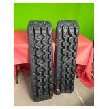 Pair of 4×4 anti skid traction track. One has