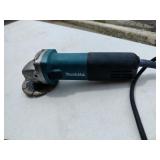 Makita Hand Held Electric Grinder. Works. Does