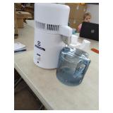 Water Distiller.  plugged in and Heats up.  May