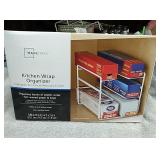 New in sealed box kitchen wrap organizer......for