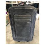 Carry on luggage- needs cleaned