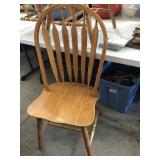 4 solid wooden chairs- USA made- all good and
