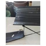 Aluminum  folding table. 18" X 27" X 16"