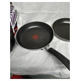 2 skillets and one small pan....2 T-fal and 1