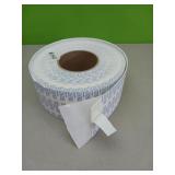 Roll of double-sided adhesive pieces