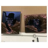2 large black panthers photos