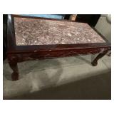 Marble coffee table with claw and ball feet