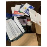 Notebook paper, envelopes, religious books, and