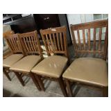 4 solid oak padded seat chairs