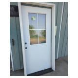 New 36" Steel Door 4 Pane Glass Prehung.  Does