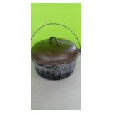 Unmarked  Cast Iron Dutch Oven  11.5" wide.  10D