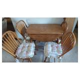 Solid Oak Drop Leaf Table & 4 Chairs  ,has 2