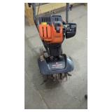Small Remington Row Rototiller  from the House