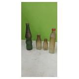 (4) Old Bottles. OI green soda bottle,Old