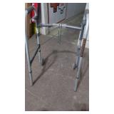 Folding Invacare Adult Walker with Wheels.