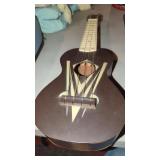 2 Vintage  Ukuleles.  Light Color needs Work.