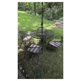 6 piece Wrought Iron Patio table .Round table & 4