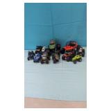 (11) Toy Monster Truck Lot