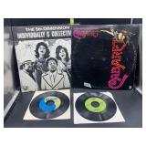 2 vinyl records and 2 45s