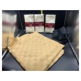 Large gold table cloth and fabric napkins