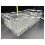 2 clear plastic trays