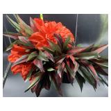 Silk flowers and decorative bucket