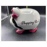 Shopping fund piggy bank- does have broken toe-